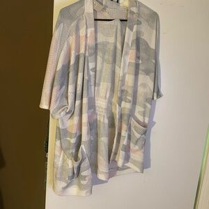 Light pink camouflage shrug.